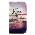 Стильный чехол книжка для iPhone 4 / 4S с разъемами для карточек "Never Stop Dreaming"